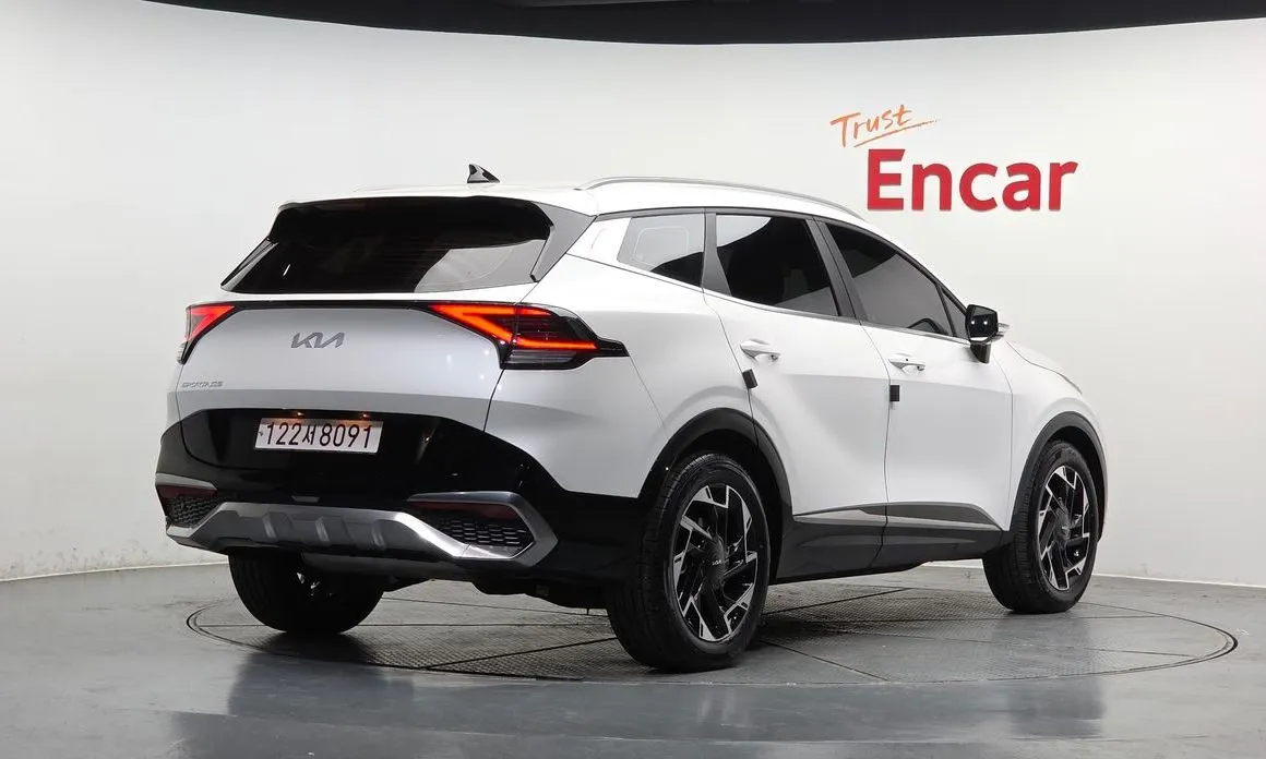 Kia Sportage — фото 9