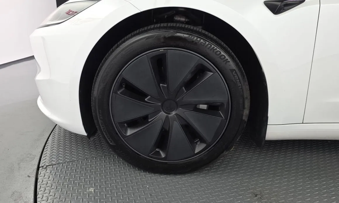 Tesla Model 3 — фото 10