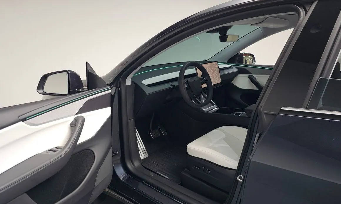 Tesla Model Y — фото 6