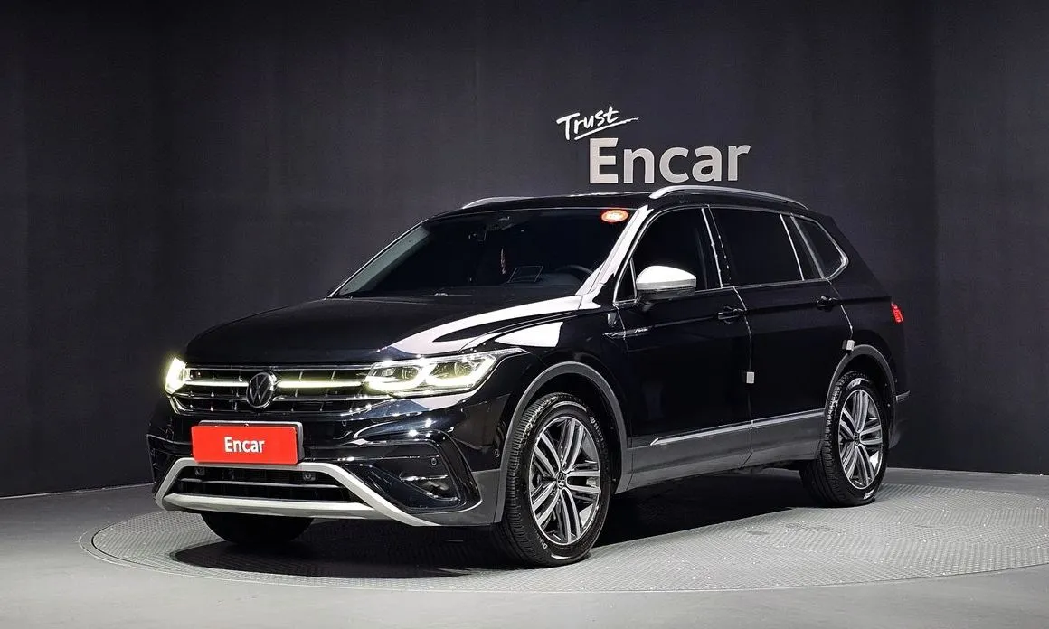 Volkswagen Tiguan — фото 1