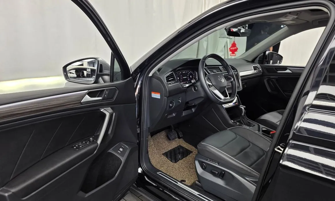 Volkswagen Tiguan — фото 10