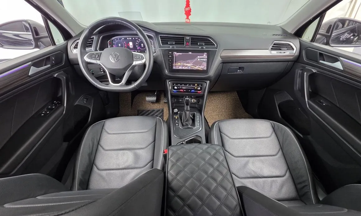 Volkswagen Tiguan — фото 6