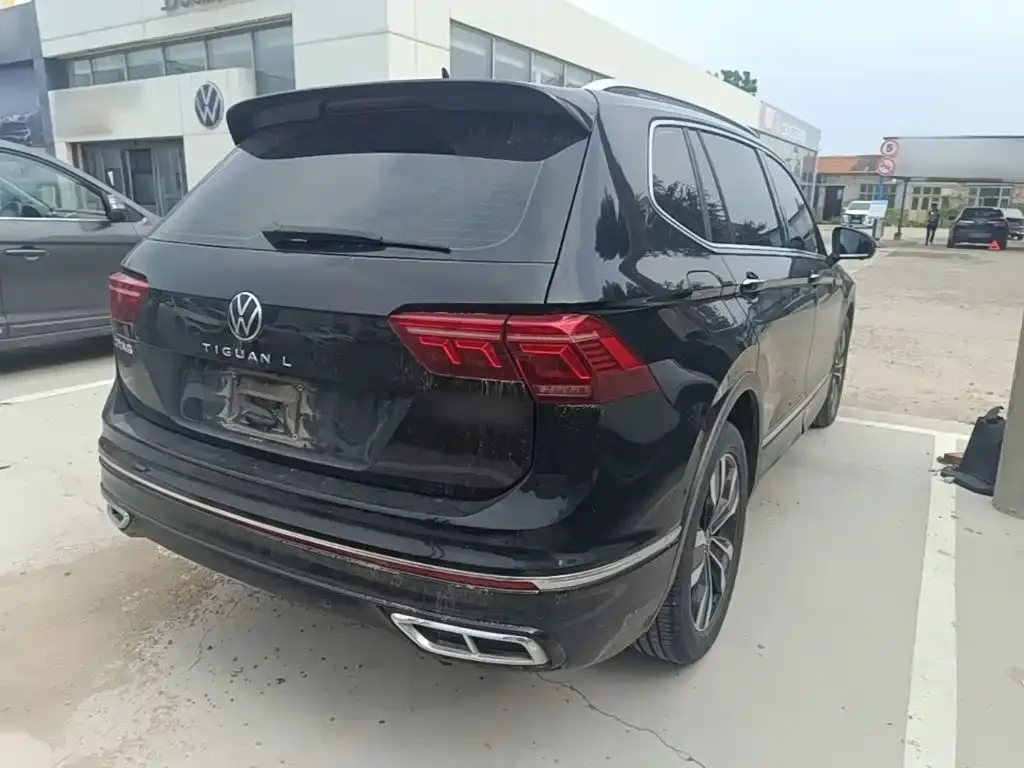 Volkswagen Tiguan L — фото 7