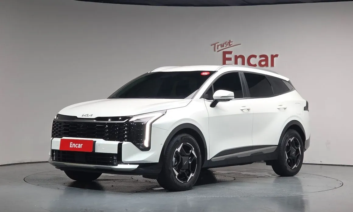 Kia Sportage — фото 1