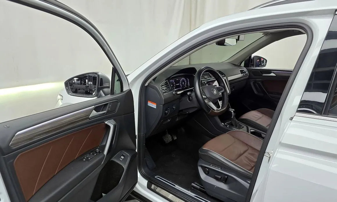 Volkswagen Tiguan — фото 6
