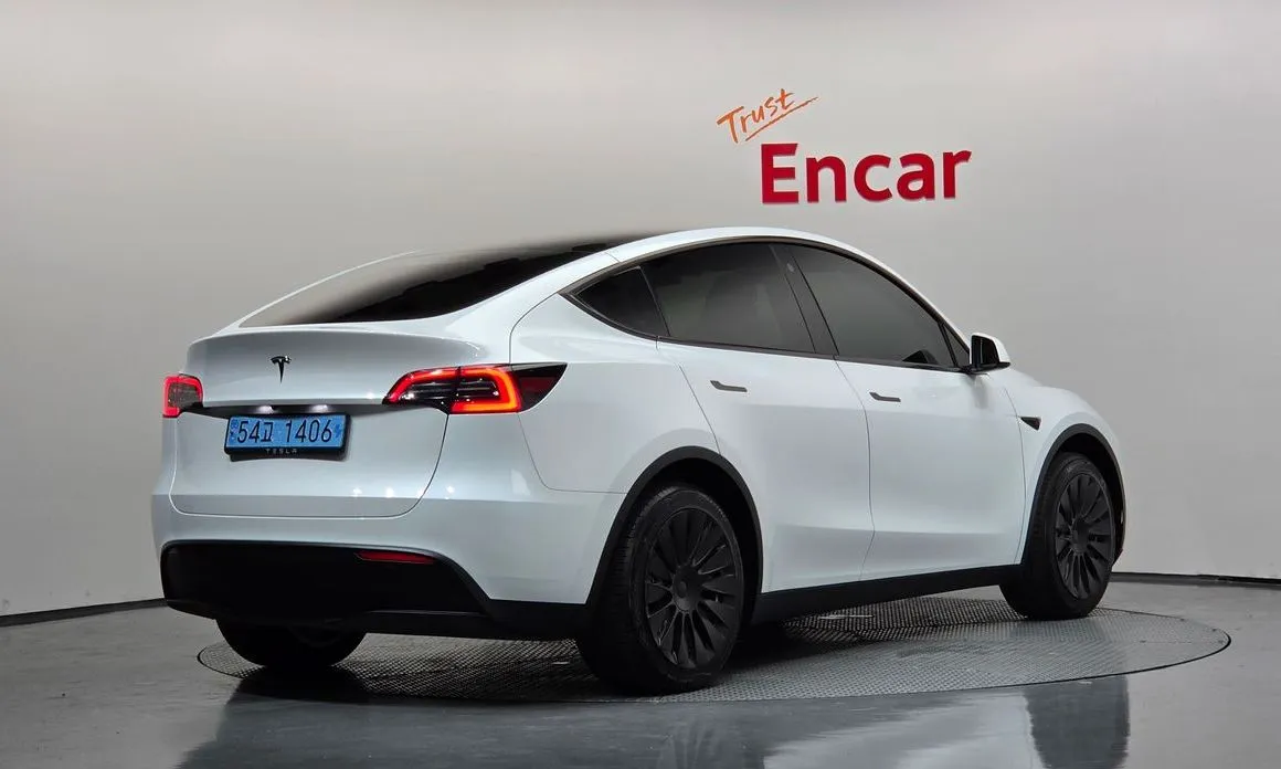 Tesla Model Y — фото 5