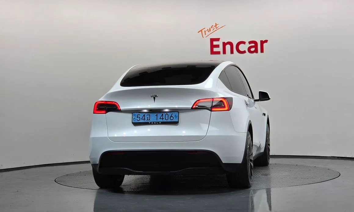 Tesla Model Y — фото 9