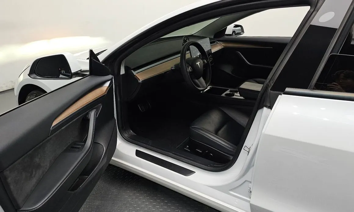 Tesla Model 3 — фото 6