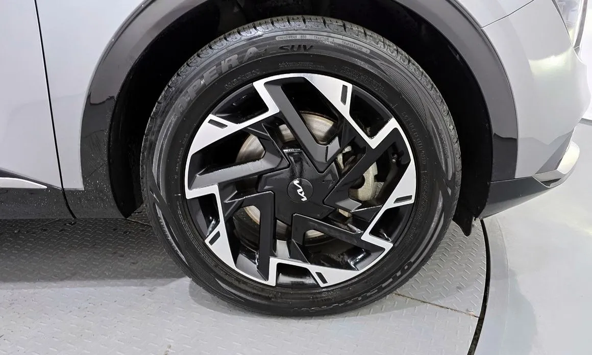 Kia Sportage — фото 10