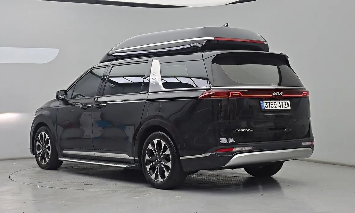 Kia Carnival — фото 10