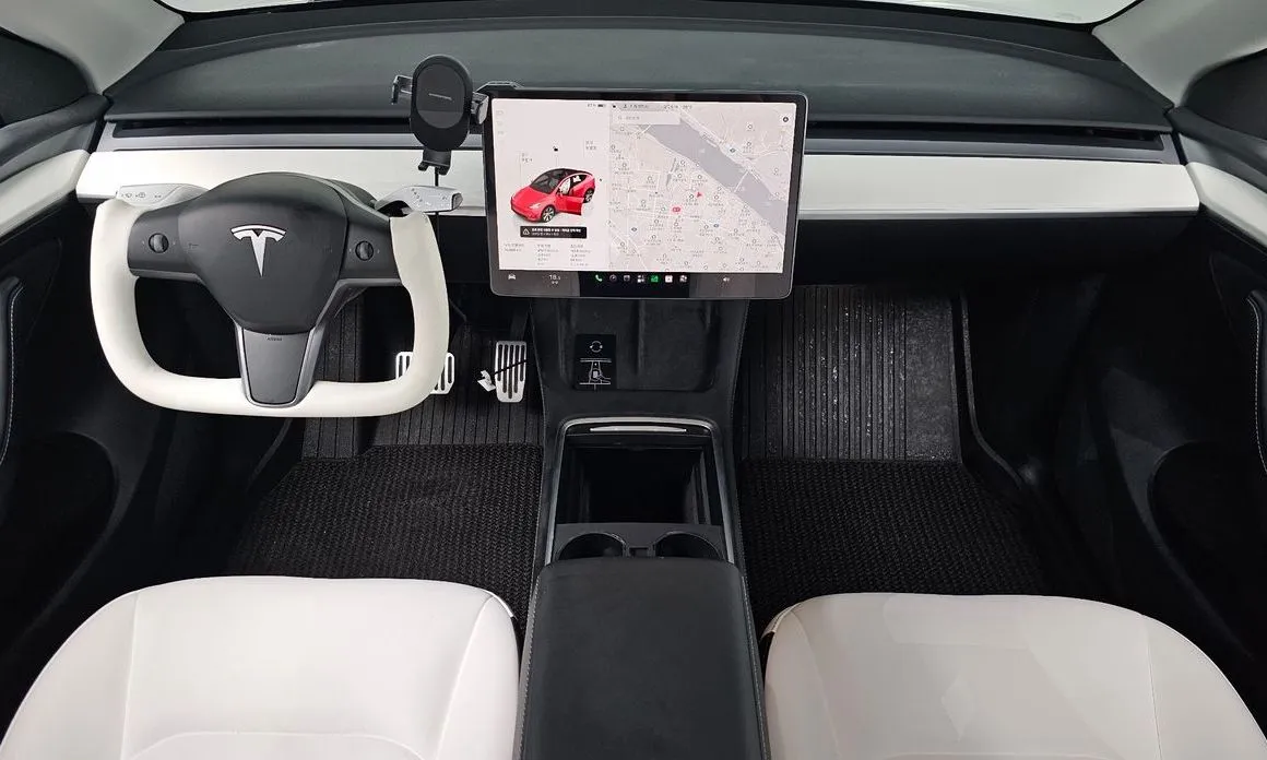Tesla Model Y — фото 10