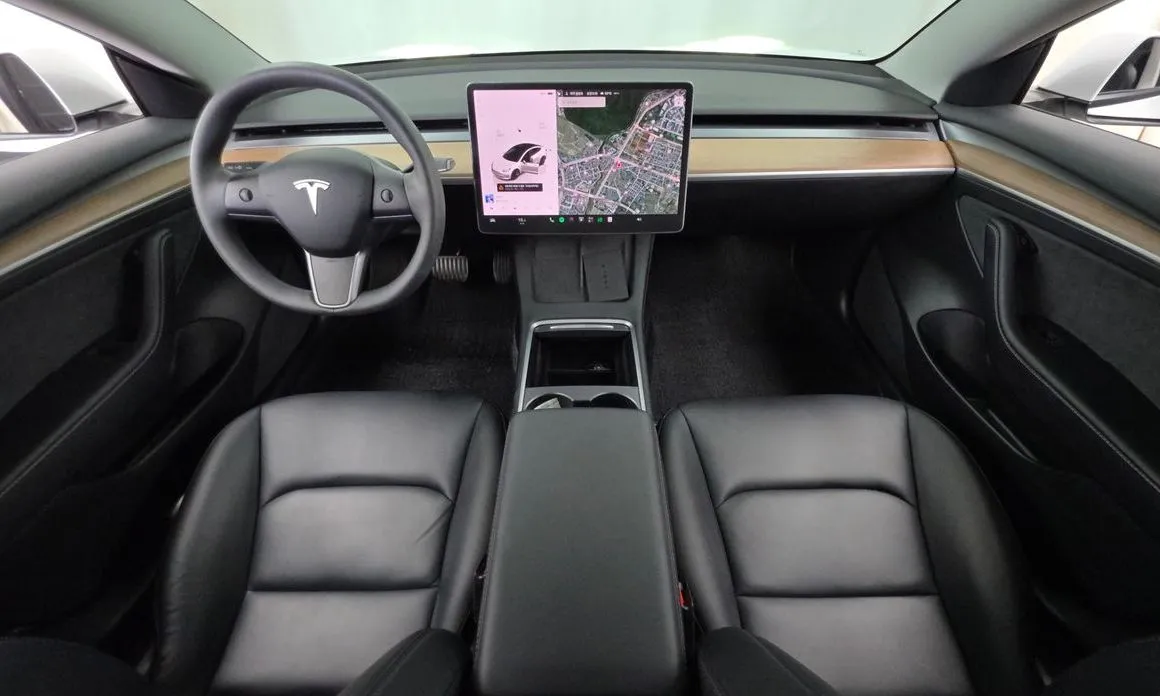 Tesla Model 3 — фото 9