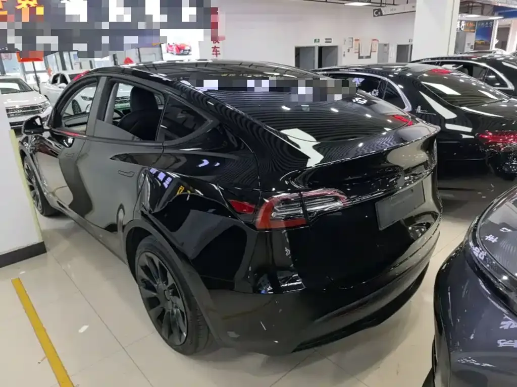 Tesla Model Y — фото 5