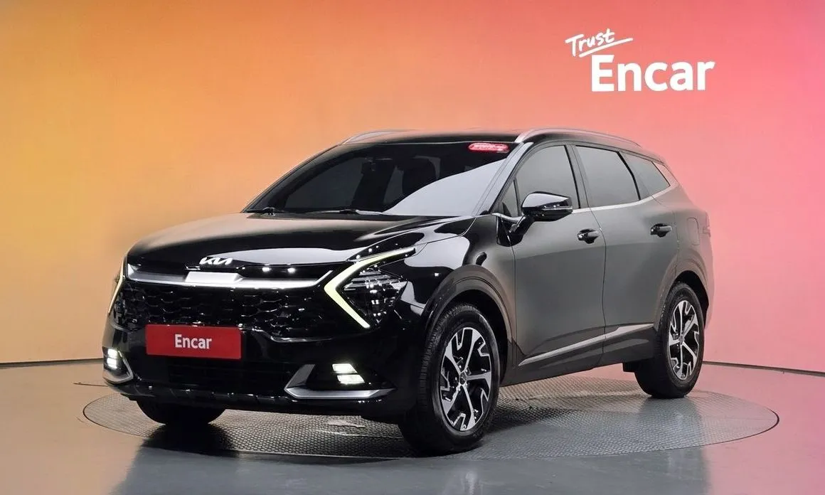 Kia Sportage — фото 1