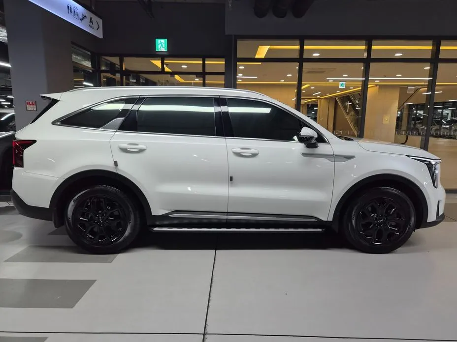 Kia Sorento — фото 7