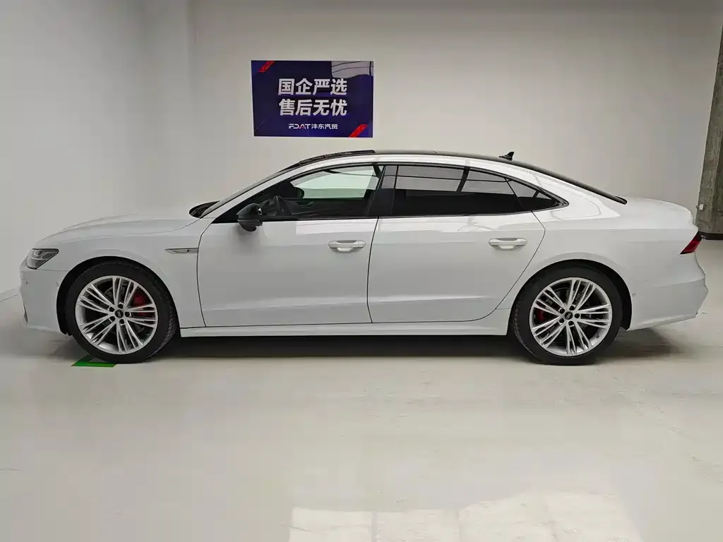 Audi A7L — фото 7