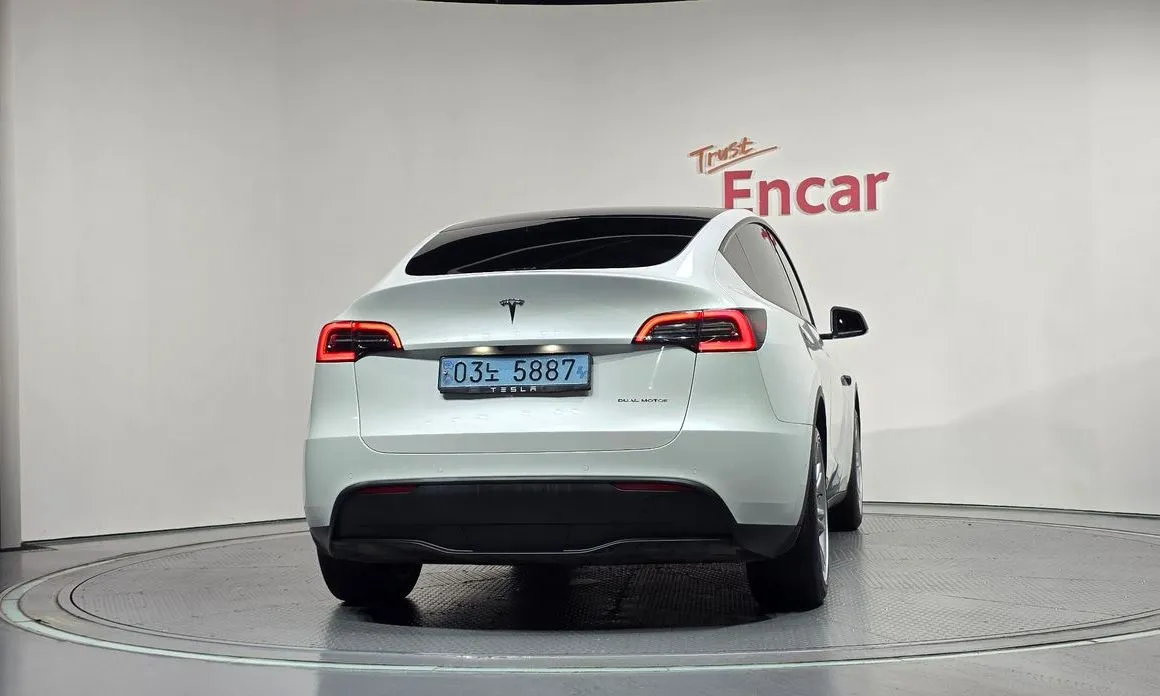 Tesla Model Y — фото 7