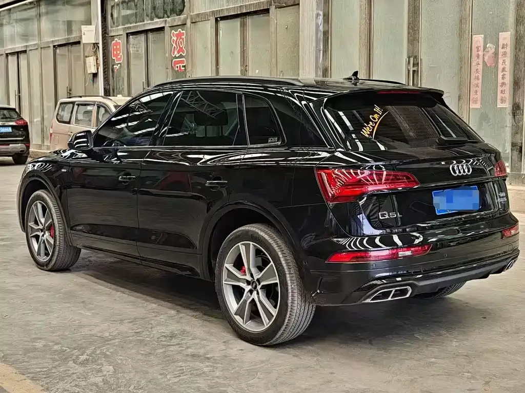 Audi Q5L — фото 5