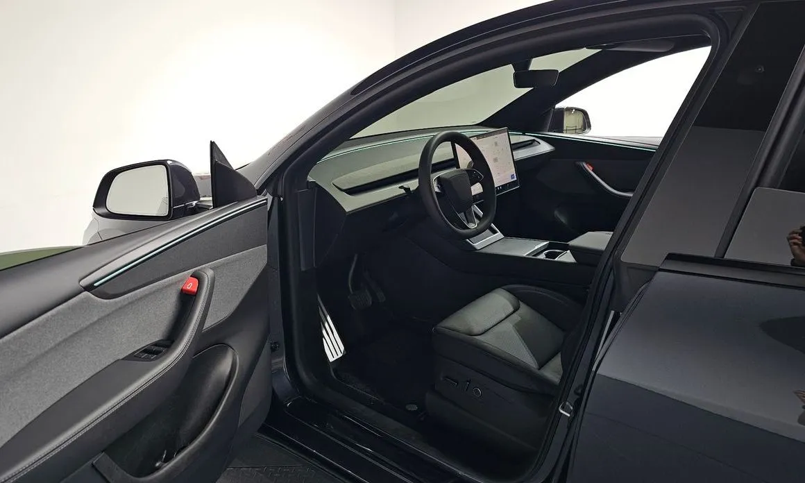 Tesla Model Y — фото 7