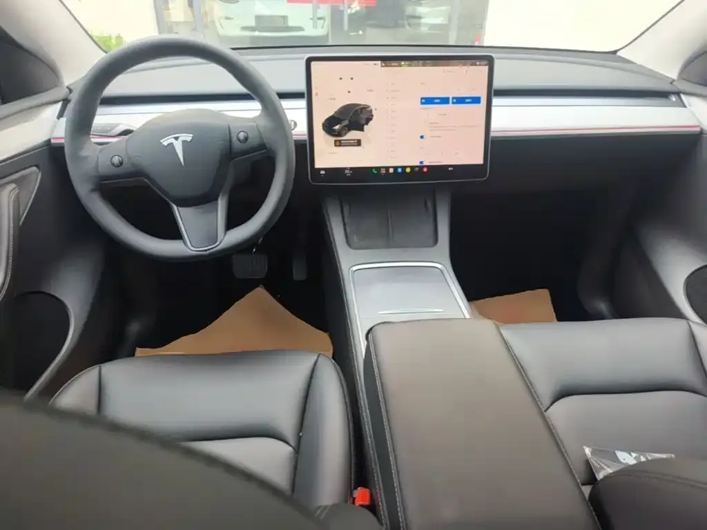 Tesla Model Y — фото 5