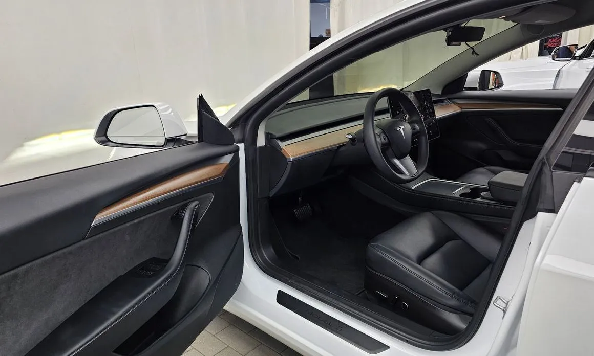 Tesla Model 3 — фото 10