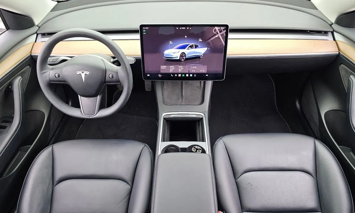 Tesla Model 3 — фото 10