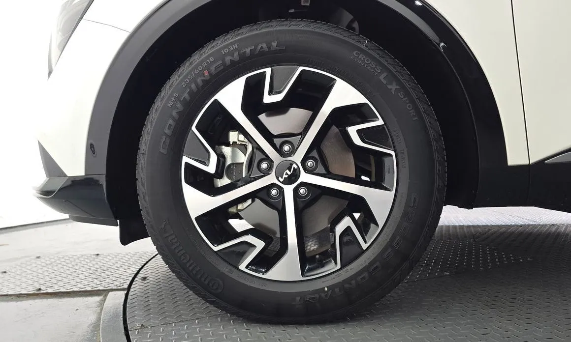 Kia Sportage — фото 10