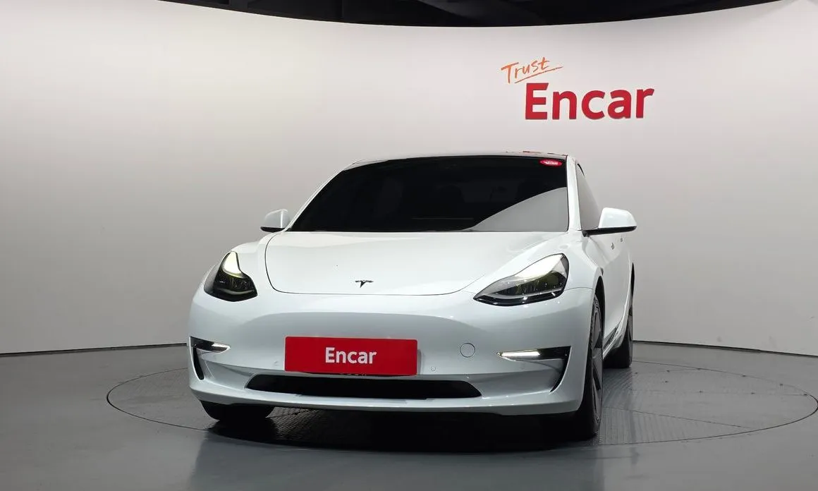 Tesla Model 3 — фото 7