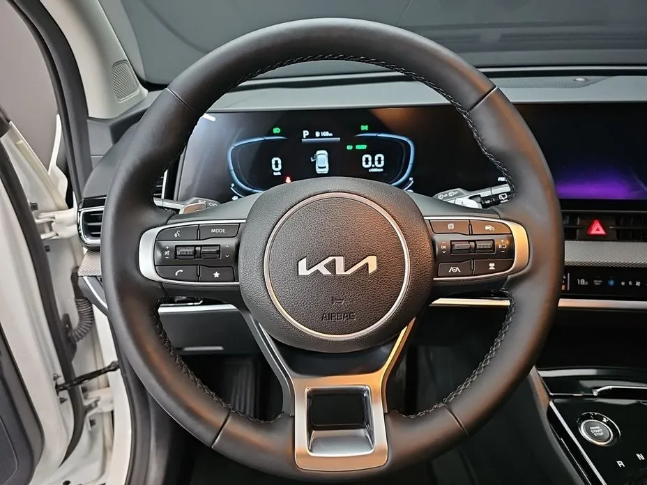 Kia Sportage — фото 10
