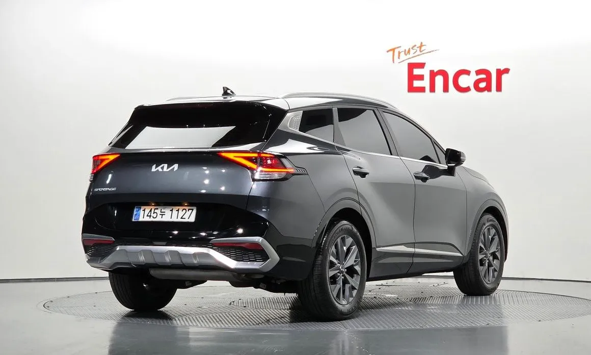 Kia Sportage — фото 9
