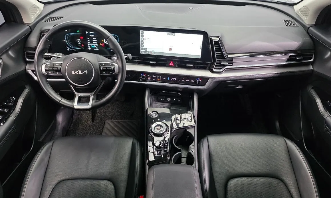 Kia Sportage — фото 10
