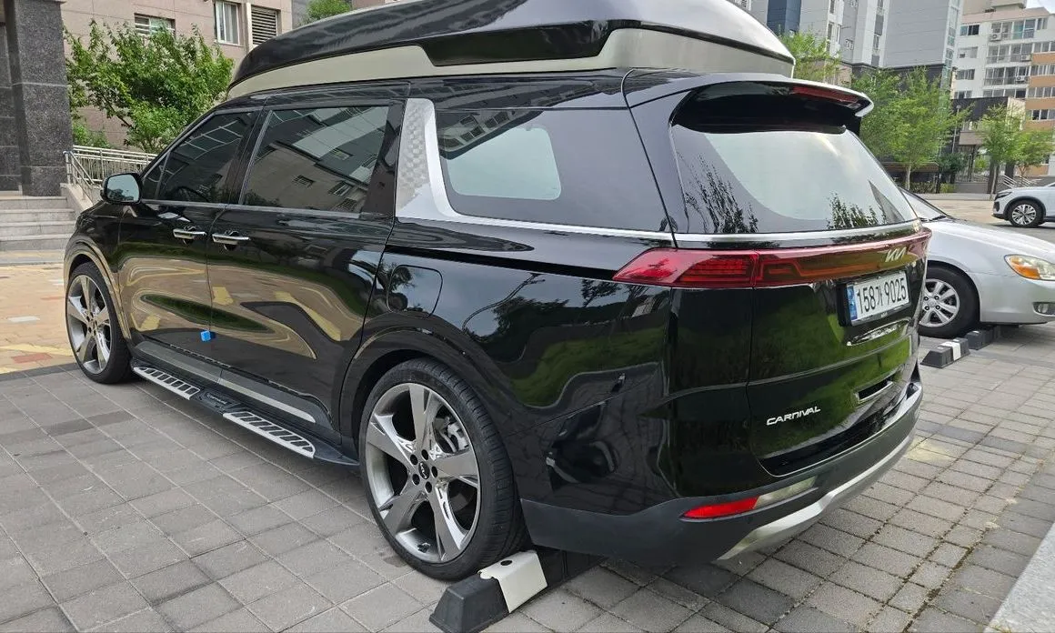 Kia Carnival — фото 10