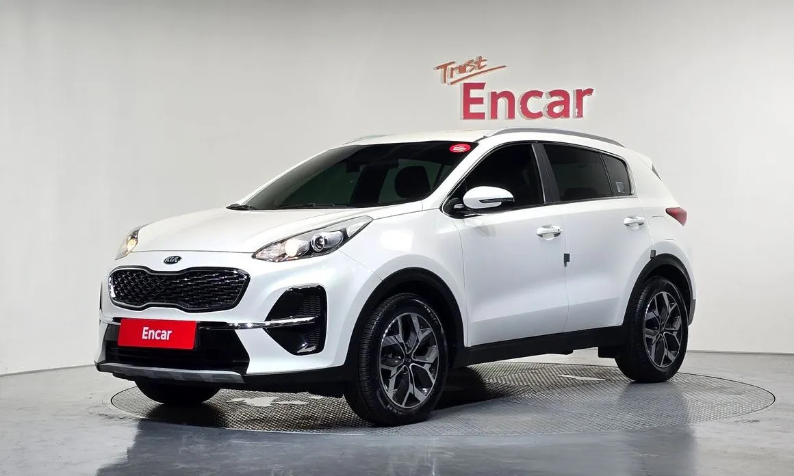 Kia Sportage — фото 1