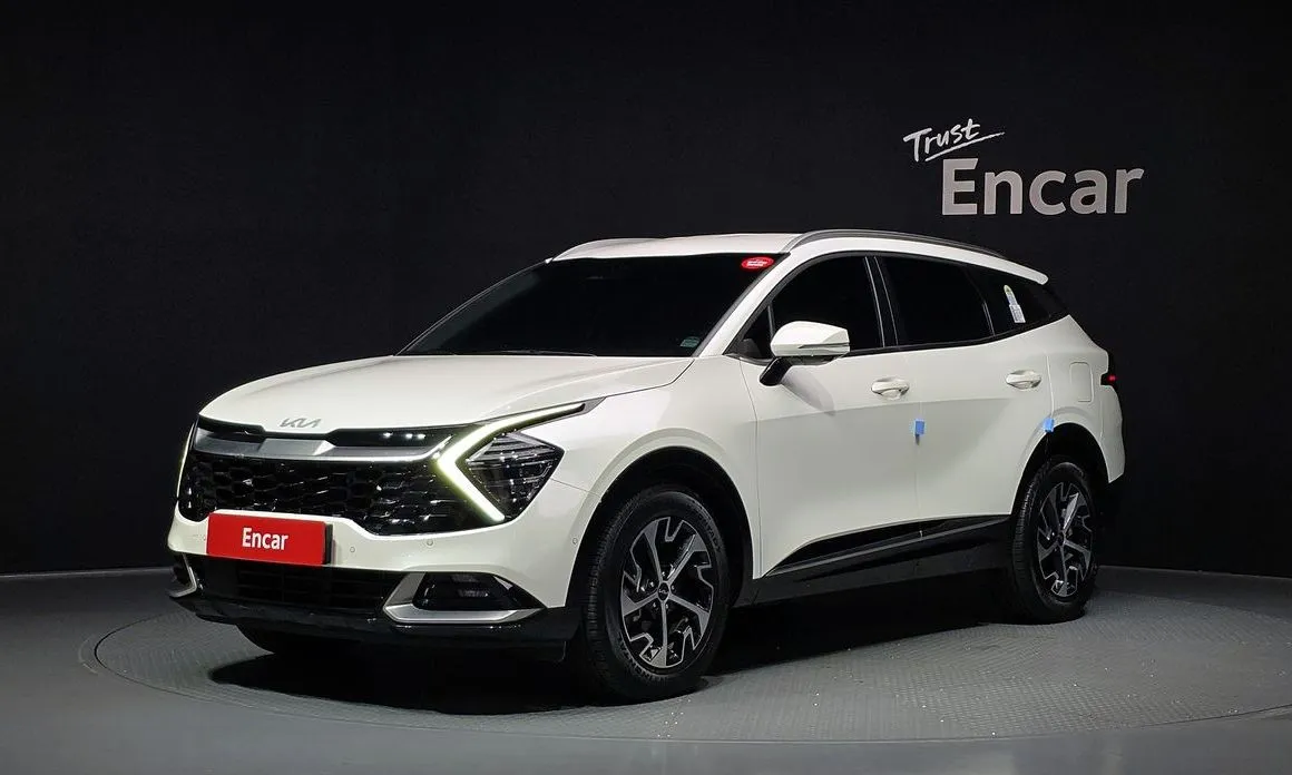 Kia Sportage — фото 1