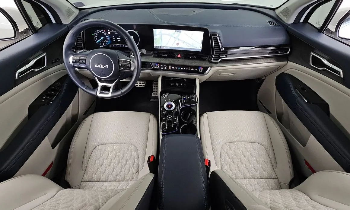 Kia Sportage — фото 10
