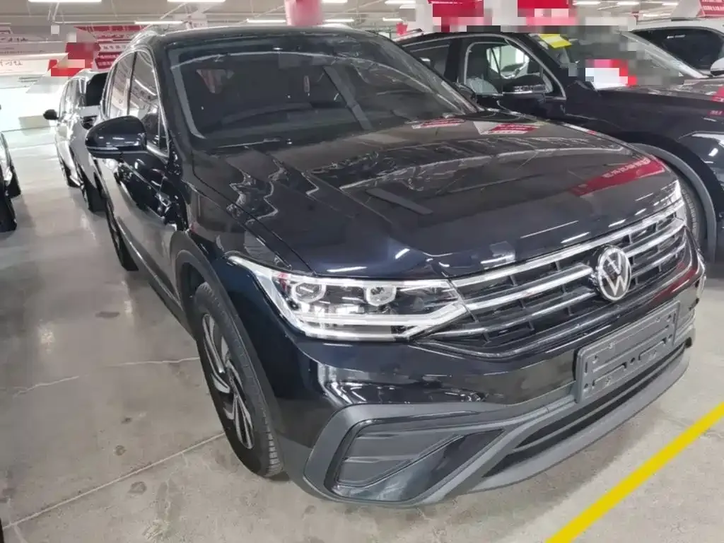Volkswagen Tiguan L — фото 10