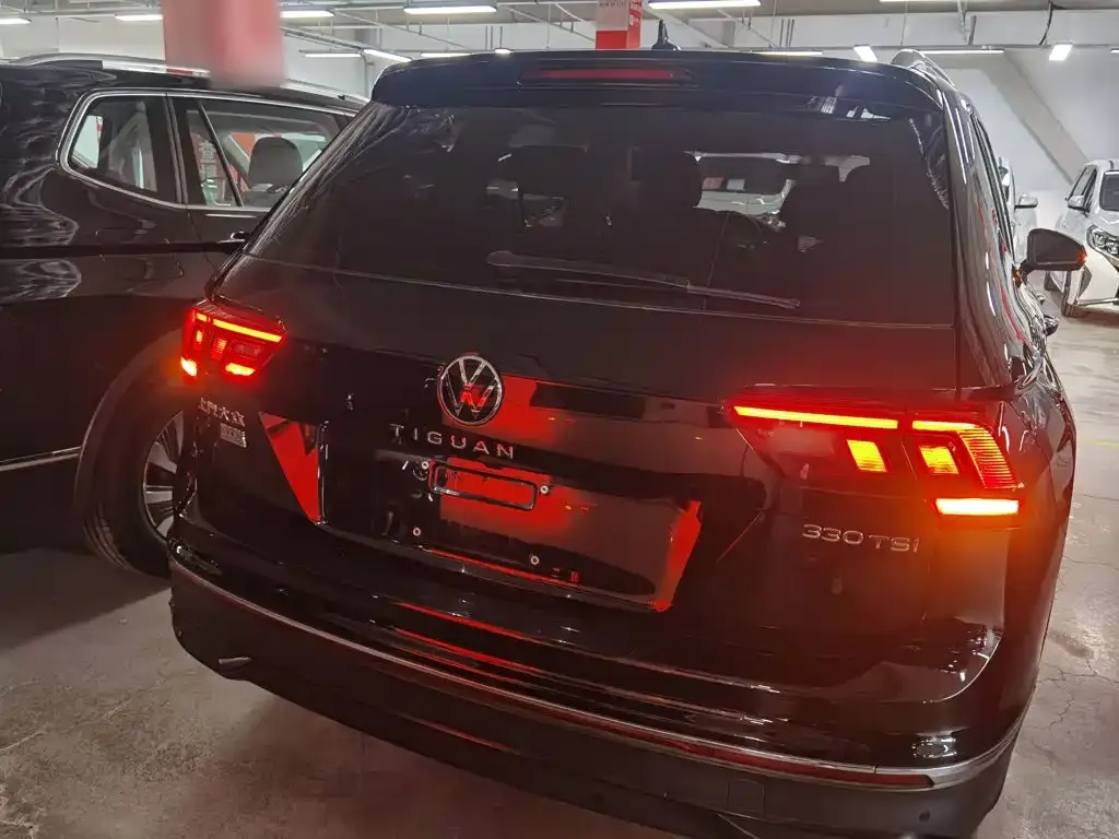 Volkswagen Tiguan L — фото 9