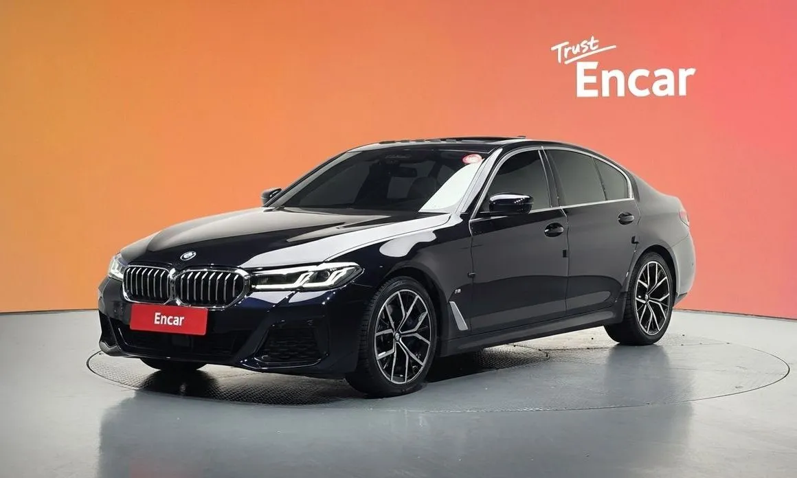 BMW 5-Series — фото 1