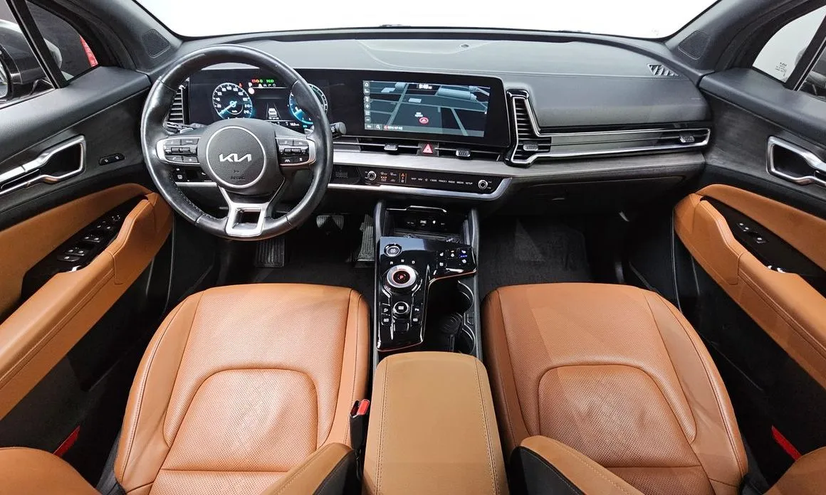 Kia Sportage — фото 9