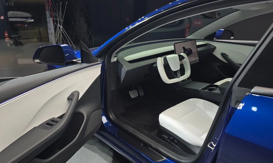 Tesla Model 3 — фото 10