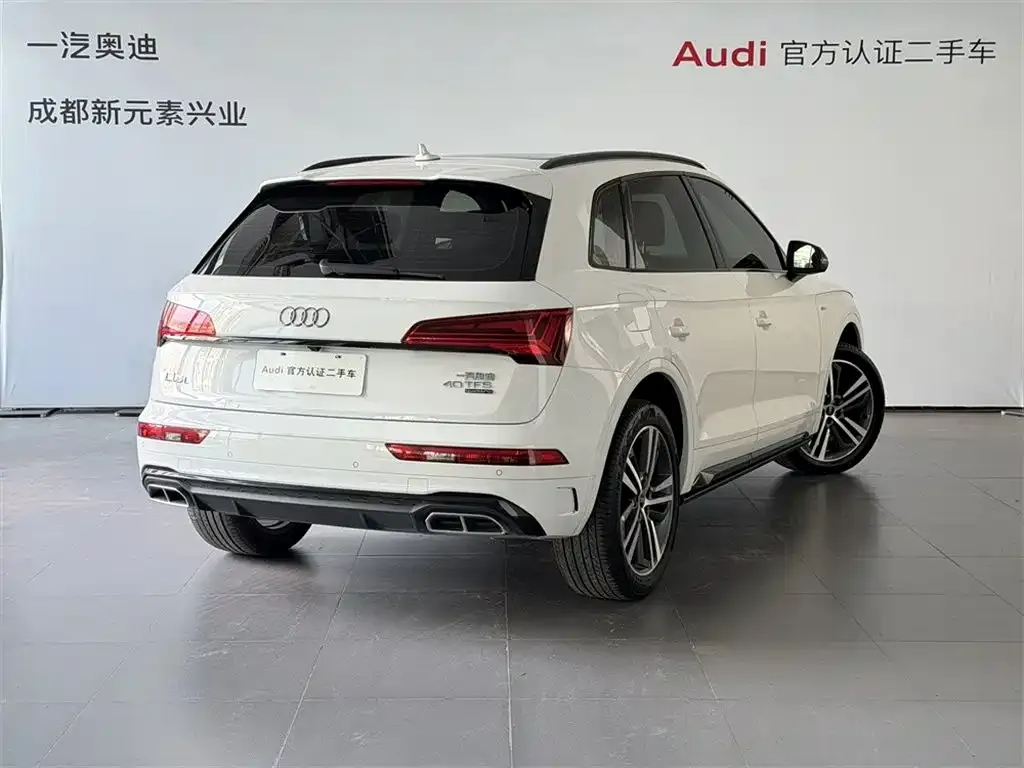 Audi Q5L — фото 10