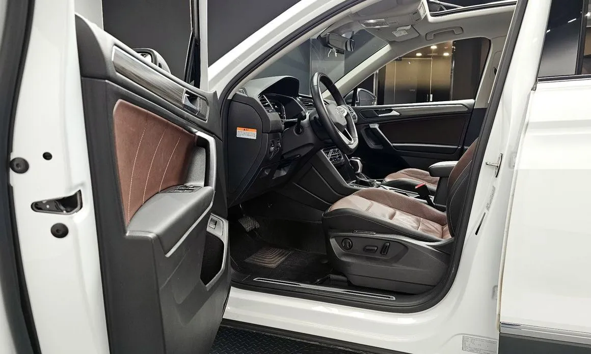 Volkswagen Tiguan — фото 8