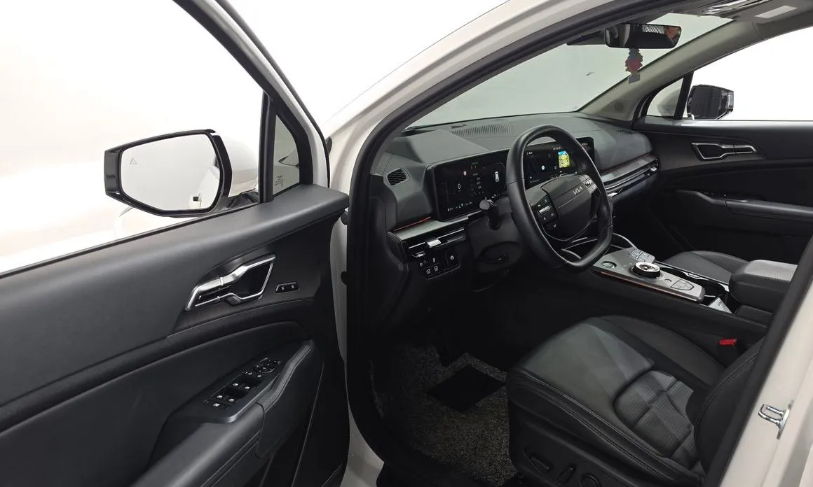 Kia Sportage — фото 9