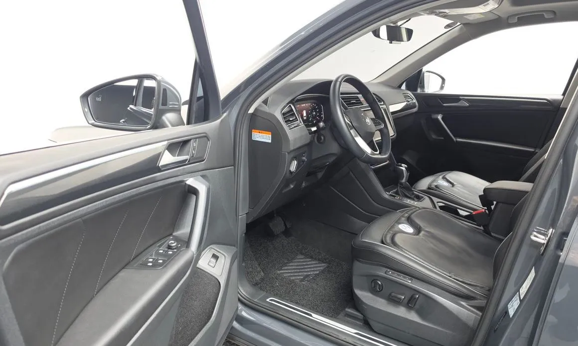 Volkswagen Tiguan — фото 10