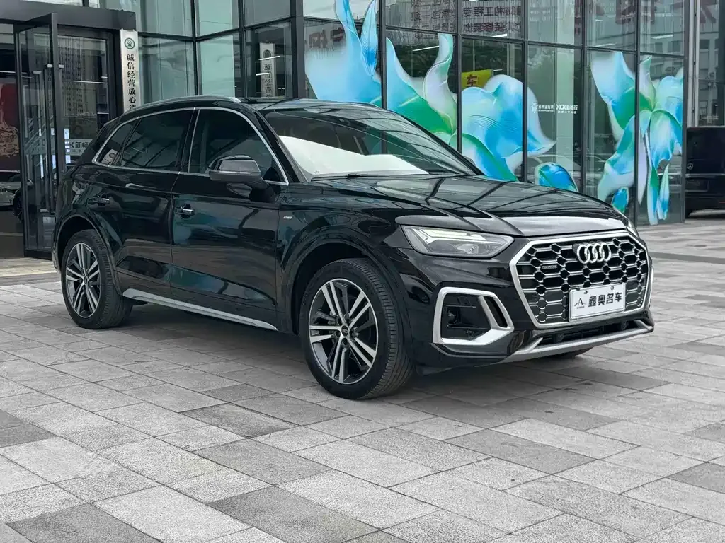 Audi Q5L — фото 8