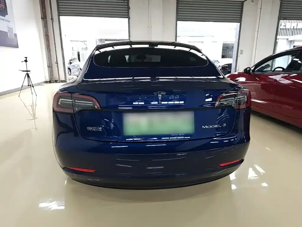 Tesla Model 3 — фото 7