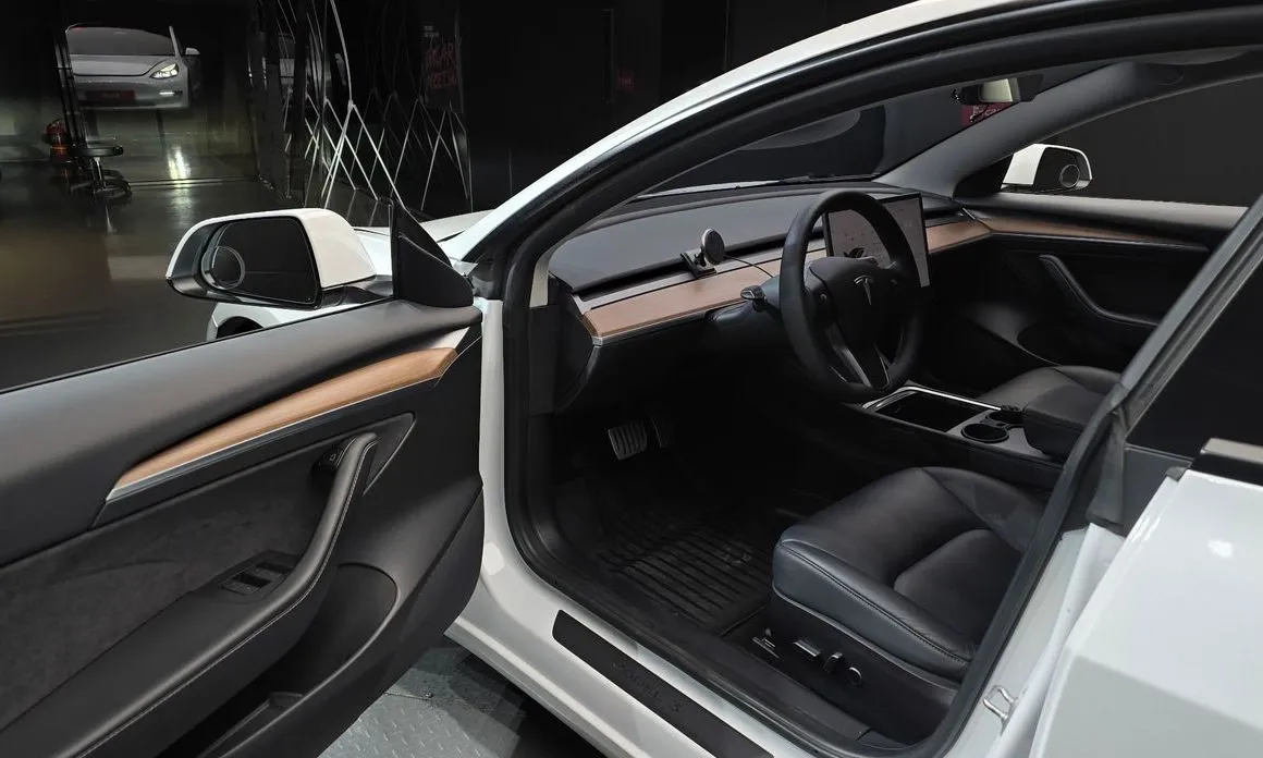 Tesla Model 3 — фото 10