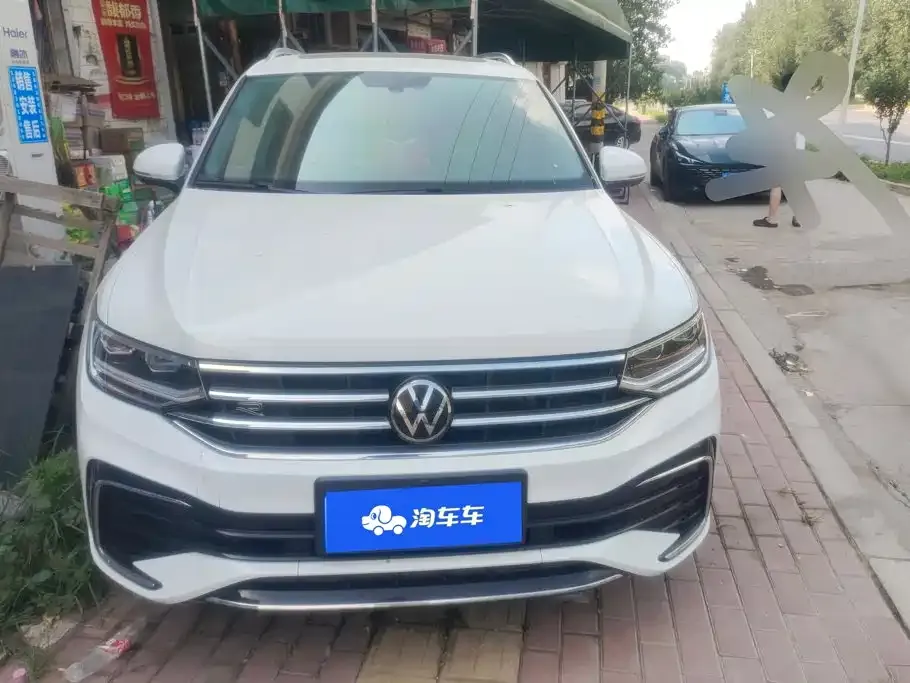 Volkswagen Tiguan L — фото 3