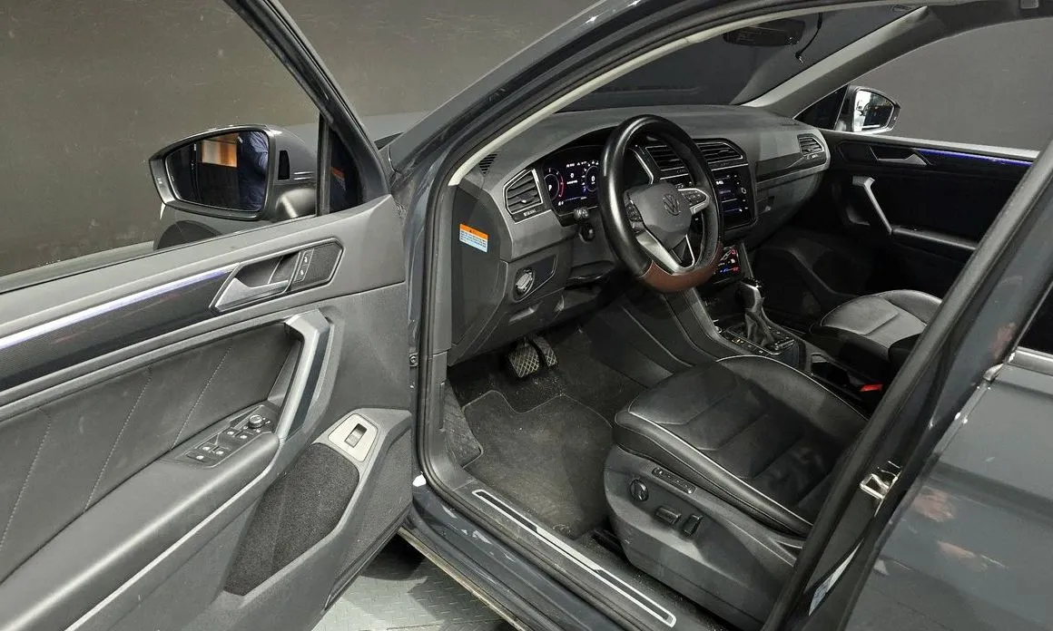 Volkswagen Tiguan — фото 9