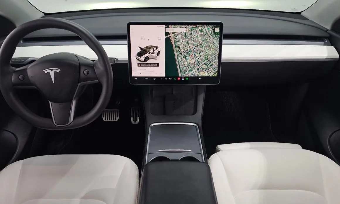 Tesla Model Y — фото 8